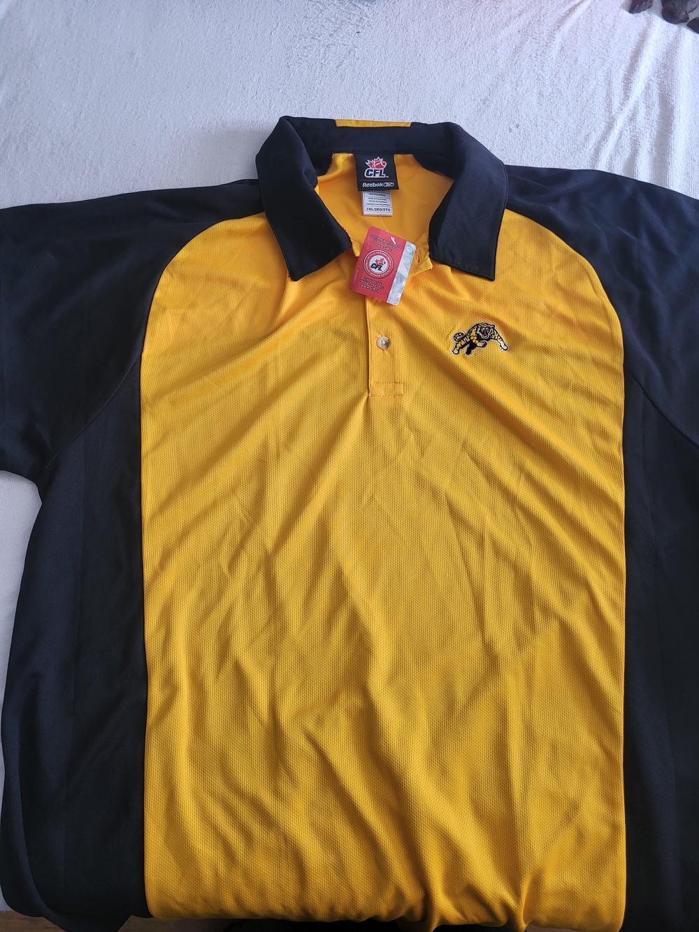 Reebok Men's Yellow and Black Hamilton Tiger-Cats Polo with Team Logo